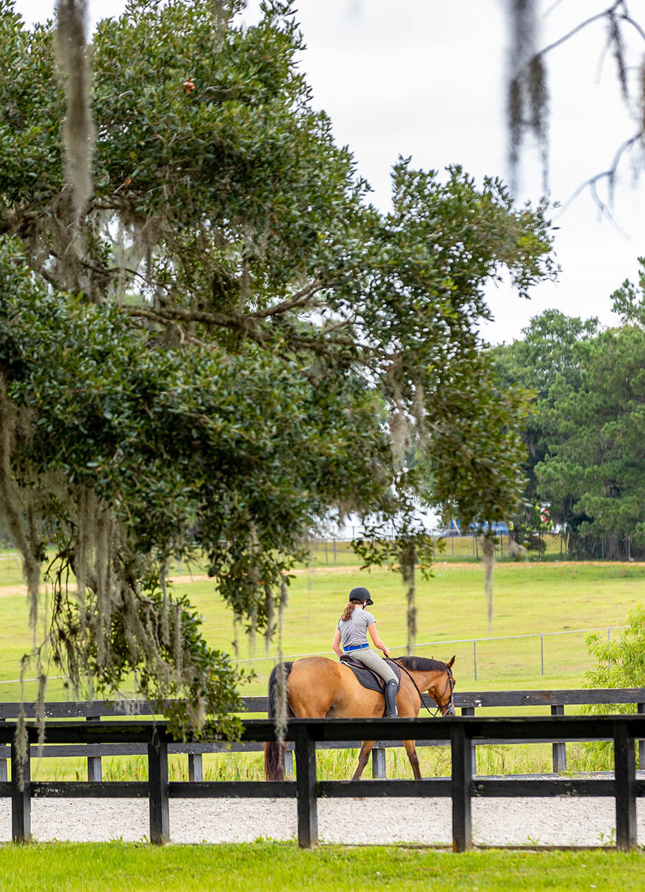 member riding a horse